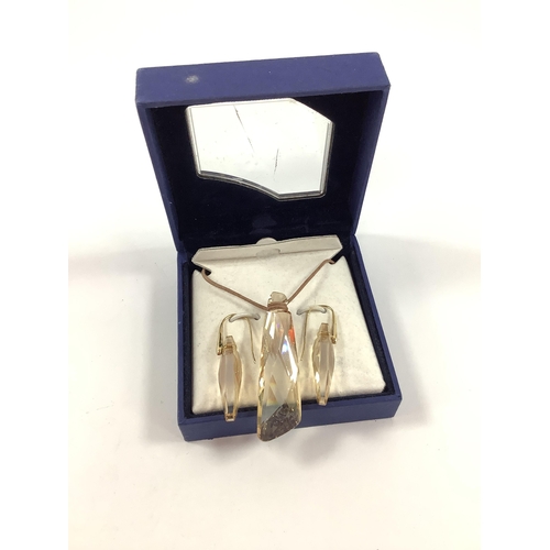 218 - Swarovski; A Pair of 'Stonehenge' Faceted Earrings, to gilt coloured hook fittings, Together with A ... 