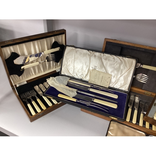 243 - Walker & Hall; An Ivorine Handled Cased Carving Set, together with further cased ivorine handled fla... 