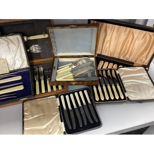 243 - Walker & Hall; An Ivorine Handled Cased Carving Set, together with further cased ivorine handled fla... 