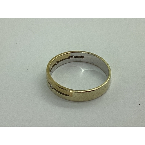 37 - A Modern Bi-Coloured Inset Band, of openwork design, stamped 