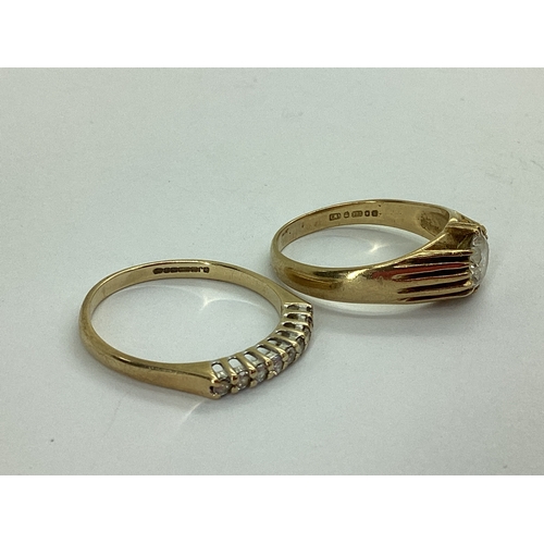 43 - A 9ct Gold Half Eternity Style Ring, claw set throughout, between plain shoulders, stamped 