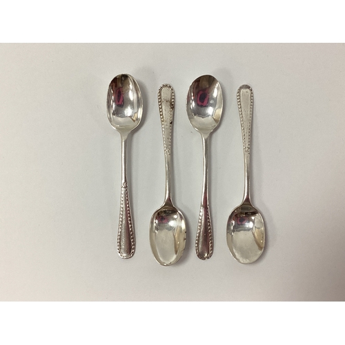 5 - A Set of Four Hallmarked Silver Coffee Spoons, with bead pattern handle edges, Isaac Ellis & Sons, S... 