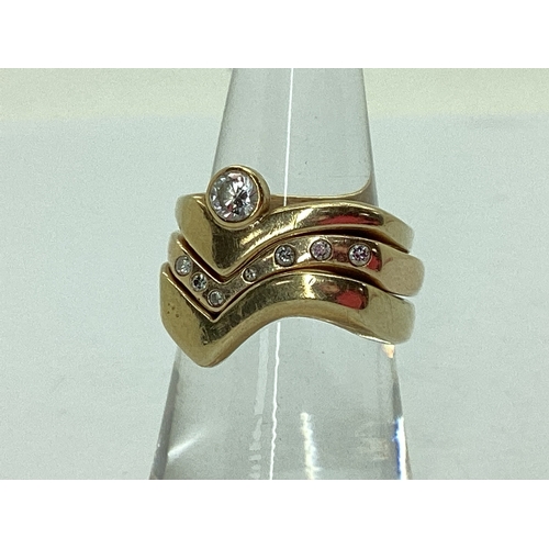 52 - A Bespoke 9ct Gold Three Piece Wedding Band Set, of modern asymmetric wishbone design, consisting of... 