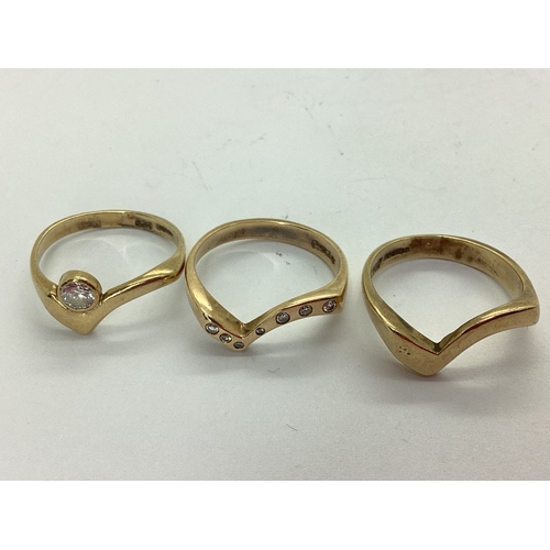 52 - A Bespoke 9ct Gold Three Piece Wedding Band Set, of modern asymmetric wishbone design, consisting of... 