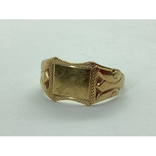 57 - A 9ct Gold Signet Ring, the plain rectangular panel between decorative shoulders (finger size T) (2.... 