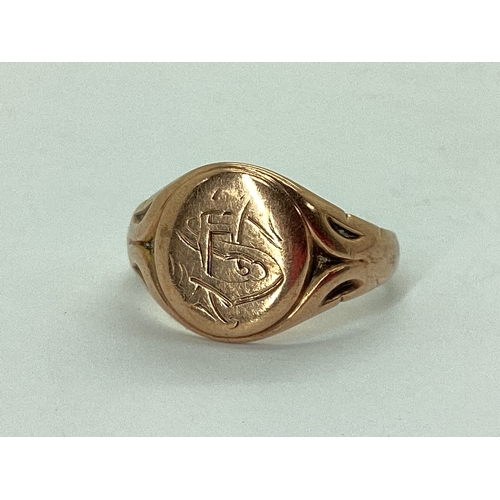 58 - A 9ct Rose Gold Signet Ring, the oval panel monogrammed, between textured shoulders (finger size P) ... 