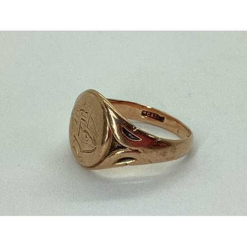 58 - A 9ct Rose Gold Signet Ring, the oval panel monogrammed, between textured shoulders (finger size P) ... 