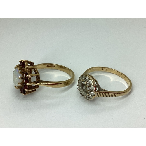 59 - A 9ct Gold Cluster Ring, of flowerhead design, claw set throughout (stone missing) (finger size N), ... 