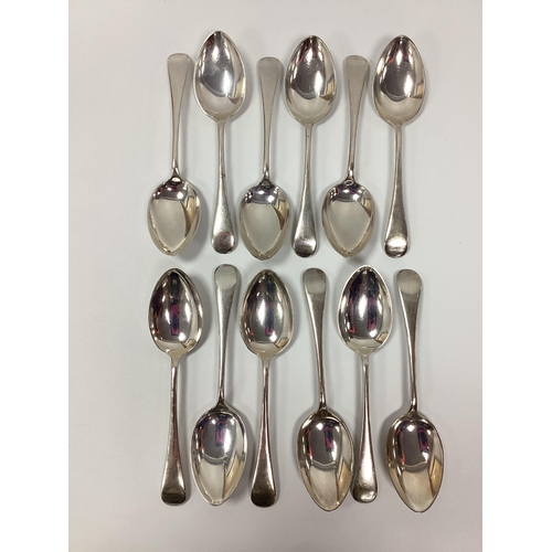 6 - A Set of Twelve Hallmarked Silver Old English Pattern Spoons, EV, Sheffield 1930 (665grams). (12)