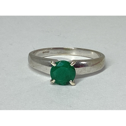 82 - A 9ct White Gold Single Stone Dress Ring, four claw set, between plain tapered shoulders (finger siz... 