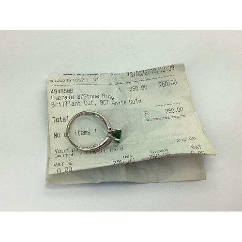 82 - A 9ct White Gold Single Stone Dress Ring, four claw set, between plain tapered shoulders (finger siz... 
