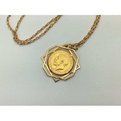 88 - A George V Full Sovereign, 1914, loose set within a geometric openwork mount, stamped 