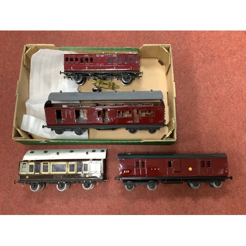 392 - Four Kit Built Gauge One/10mm Coaches, to include a bogie passenger/brake in L.M.S red, requires doo... 