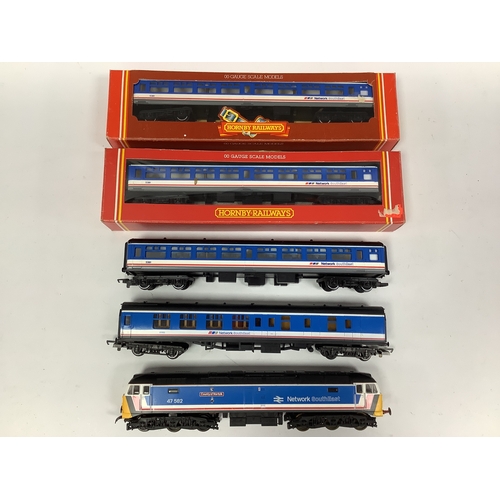 512 - A Lima 00 gauge Class 47diesel in Network South-East livery (untested) with four coaches (two boxed)... 