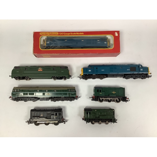533 - Seven '00' Gauge Diesel Locomotives: a boxed Hornby Class 31 in BR blue; a Triang green Class 31; a ... 