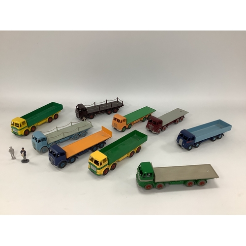 581 - Nine Original Cast Dinky Eight Wheel Lorries, including Foden's, all repainted.