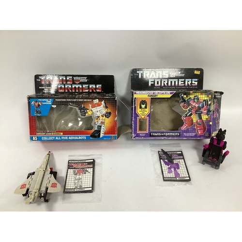 657 - Two boxed circa 1980's Hasbro G1 Transformers. Comprising of Headmaster Decepticon Fangry (with gun)... 