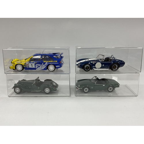 707 - Four 1:18 Scale Diecast Model Cars comprising of Kyosho Morgan, Chrono Triumph Spitfire Mk IV, Kyosh... 