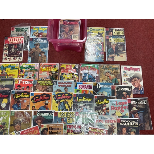 798 - Approximately Sixty Golden and Silver Age comics all with a Western theme by Marvel, Dell, Charlton,... 
