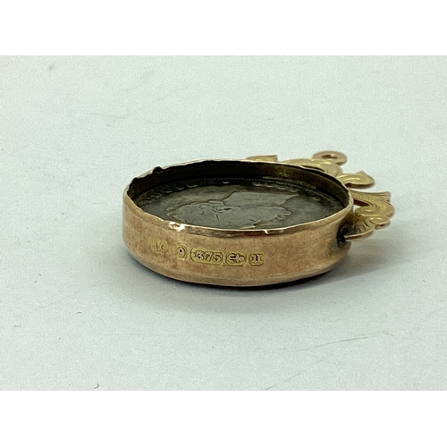74 - A Late Victorian 9ct Gold Mounted Enamel Coin Fob Pendant, inset with earlier George IV 1826 Shillin... 