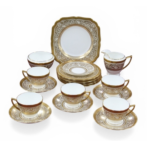 A Minton Porcelain Part Tea Service, decorated in the 'Porcelain Ball ...