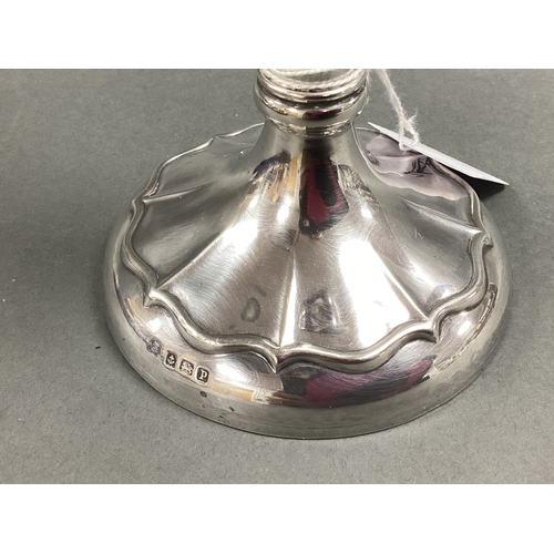 10 - A Hallmarked Silver Trumpet Vase, Birmingham 1914, plain tapering stem below shaped flared rim, on c... 