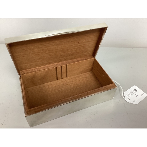 4 - A Hallmarked Silver Rectangular Cigarette Box, of plain design, engraved to lid 