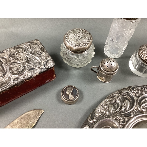 45 - A Chester Hallmarked Silver Backed Hand Mirror, William Neale, 1899, foliate scroll relief throughou... 