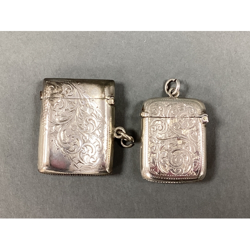 55 - A Hallmarked Silver Rectangular Vesta Case, part-textured with decorative scroll pattern, Birmingham... 