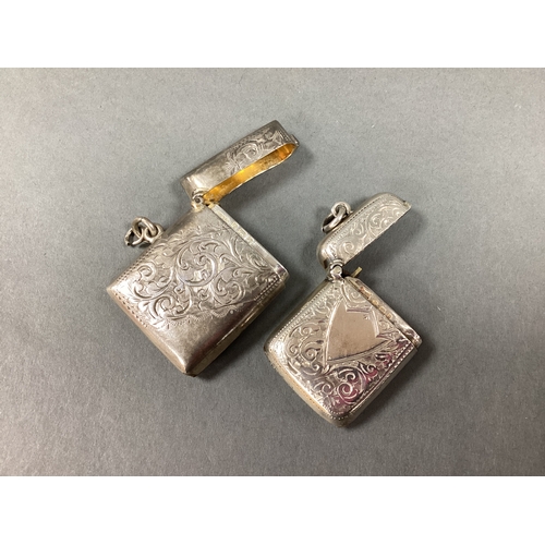 55 - A Hallmarked Silver Rectangular Vesta Case, part-textured with decorative scroll pattern, Birmingham... 
