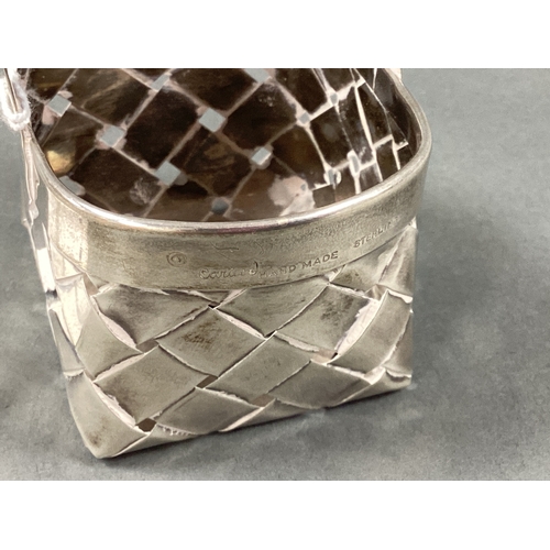 60 - Cartier; A Miniature Woven Basket, signed and stamped 