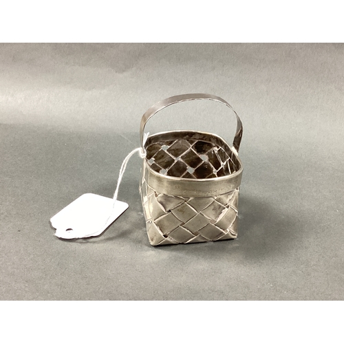 60 - Cartier; A Miniature Woven Basket, signed and stamped 