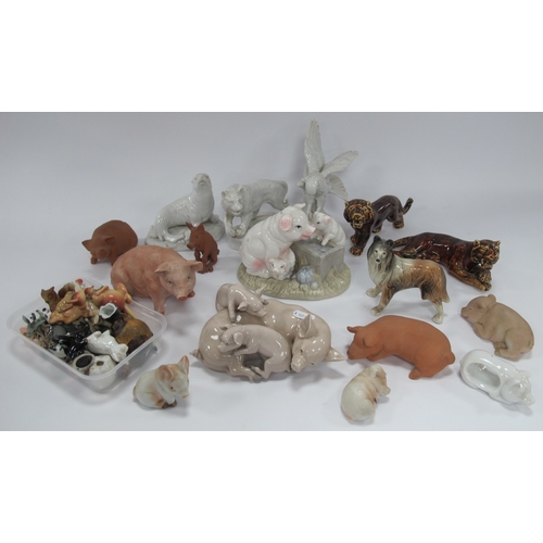 1200 - Collection of ceramic and porcelain animal figures, mainly pigs and piglets in various glazes, inclu... 