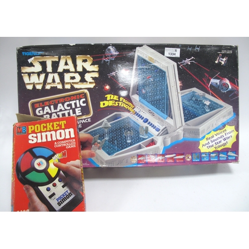 1334 - A Tiger Electronics Star Wars Electronic Galactic Battle Space Combat game, boxed. Together with a M... 