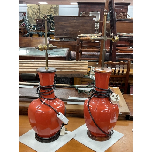 1612 - A pair of Terracotta Glazed Table Lamps, featuring octagonal, baluster form ceramic bases with oxblo... 