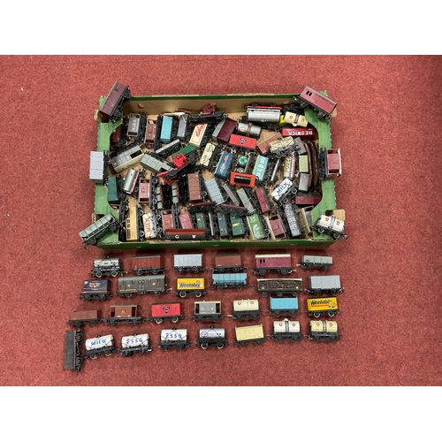 435 - Approximately seventy-five steam era wagons and brake vans by Hornby, Dapol and others, playworn.