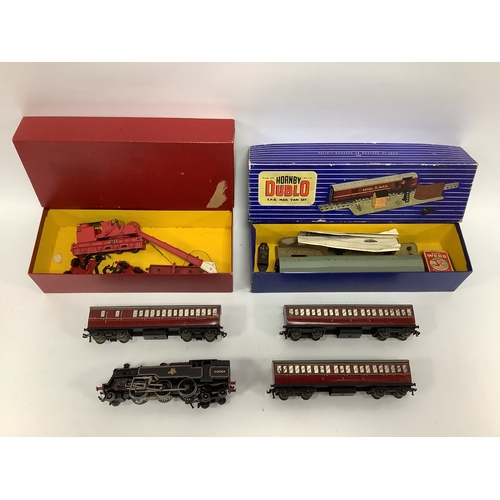519 - Hornby Dublo 3 rail comprising of a 2-6-4 Tank, Three Suburban Coaches, boxed TPO Mail Van and a 2-r... 