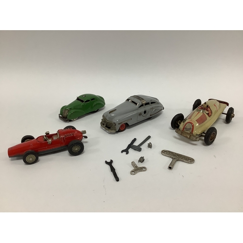 810 - Four Original Mid XX Century Tinplate/Clockwork Cars, a 'Gescha' Auto Union(missing the drivers head... 