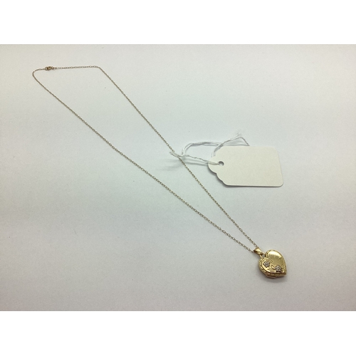 A Modern 9ct Gold Heart Shape Locket Pendant, foliate detail to the ...