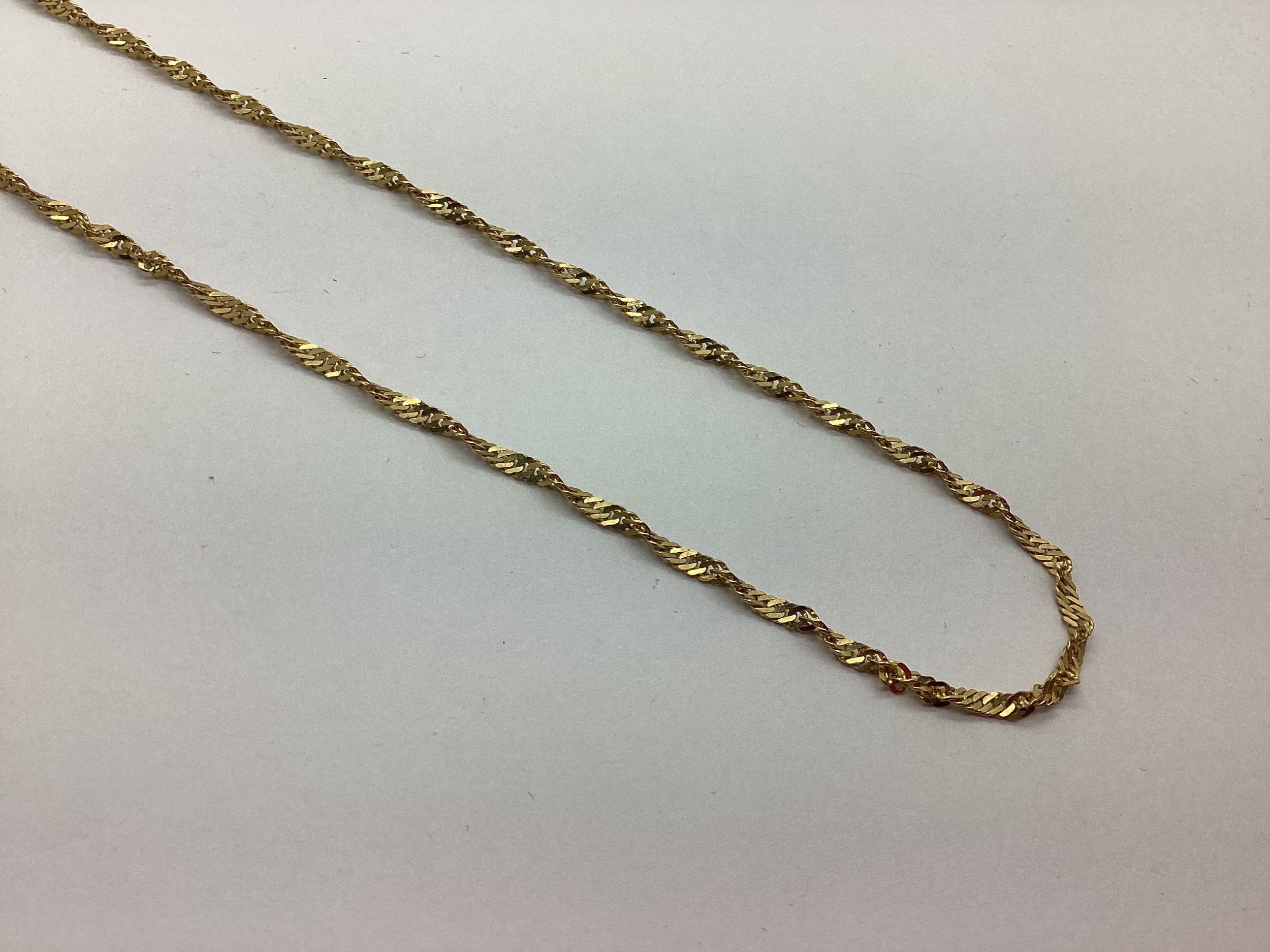 A Fancy Twist Style Chain, stamped 