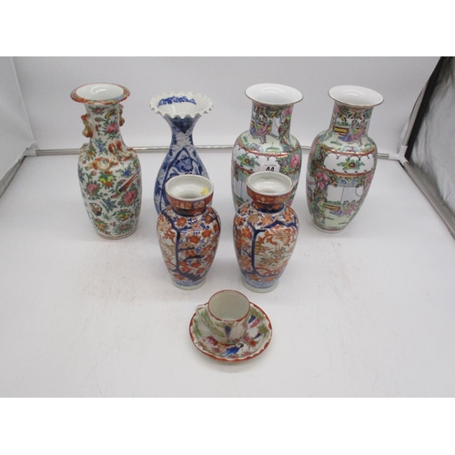 44 - Six Oriental Vases and a Cup and Saucer