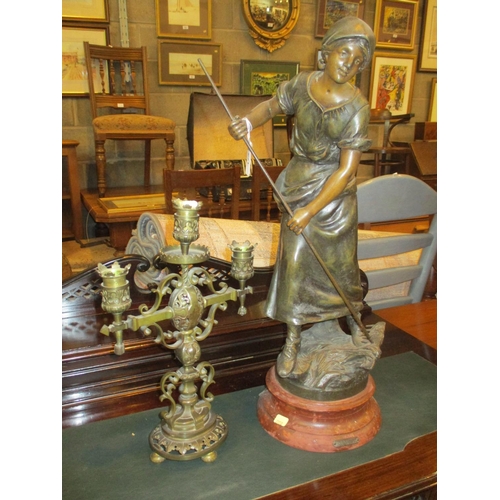 173 - Victorian Spelter Figure Faneuse after Moreau, and a Brass Candelabra