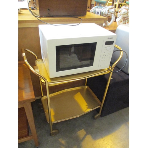 633 - Gilt Metal Trolley and Bosch Microwave