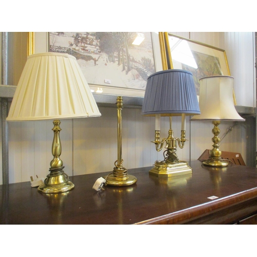 352 - Four Brass Lamps