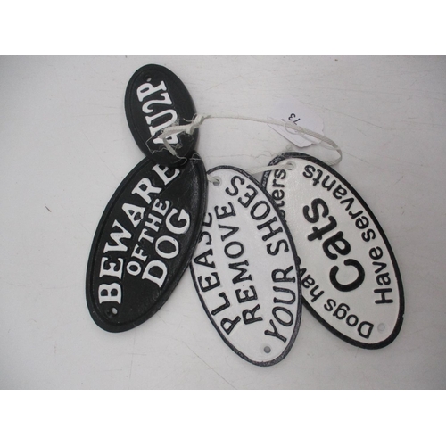 73 - Four Oval Cast Iron Signs