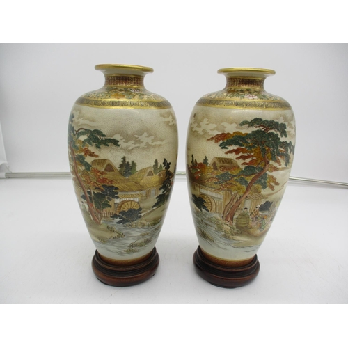 451 - Pair of Satsuma Pottery Vases Painted with a Continuous Scene, 21cm, along with Wooden Stands