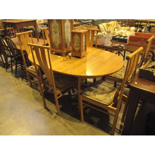 642 - Ercol Light Elm Extending Dining Table with 6 Chairs