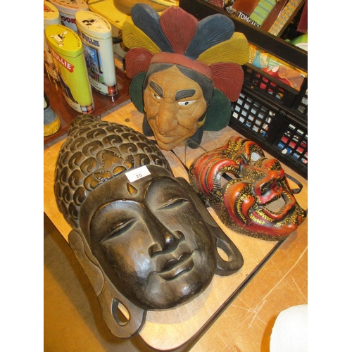 25 - Carved Wood American Indian Head and 2 Masks