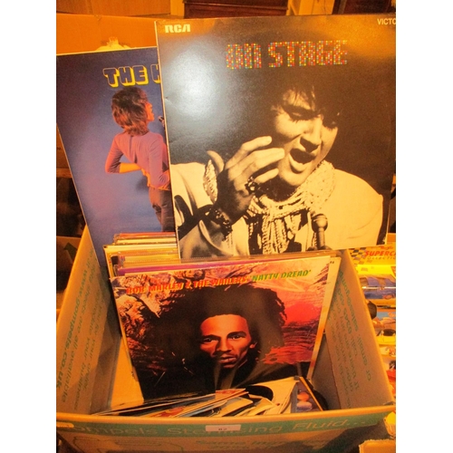 82 - Box of LPs and 45s including Elvis, Rolling Stones, Bob Marley