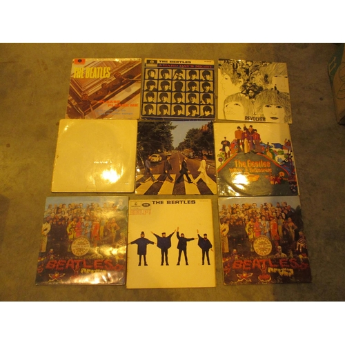 238 - Case of The Beatles LPs